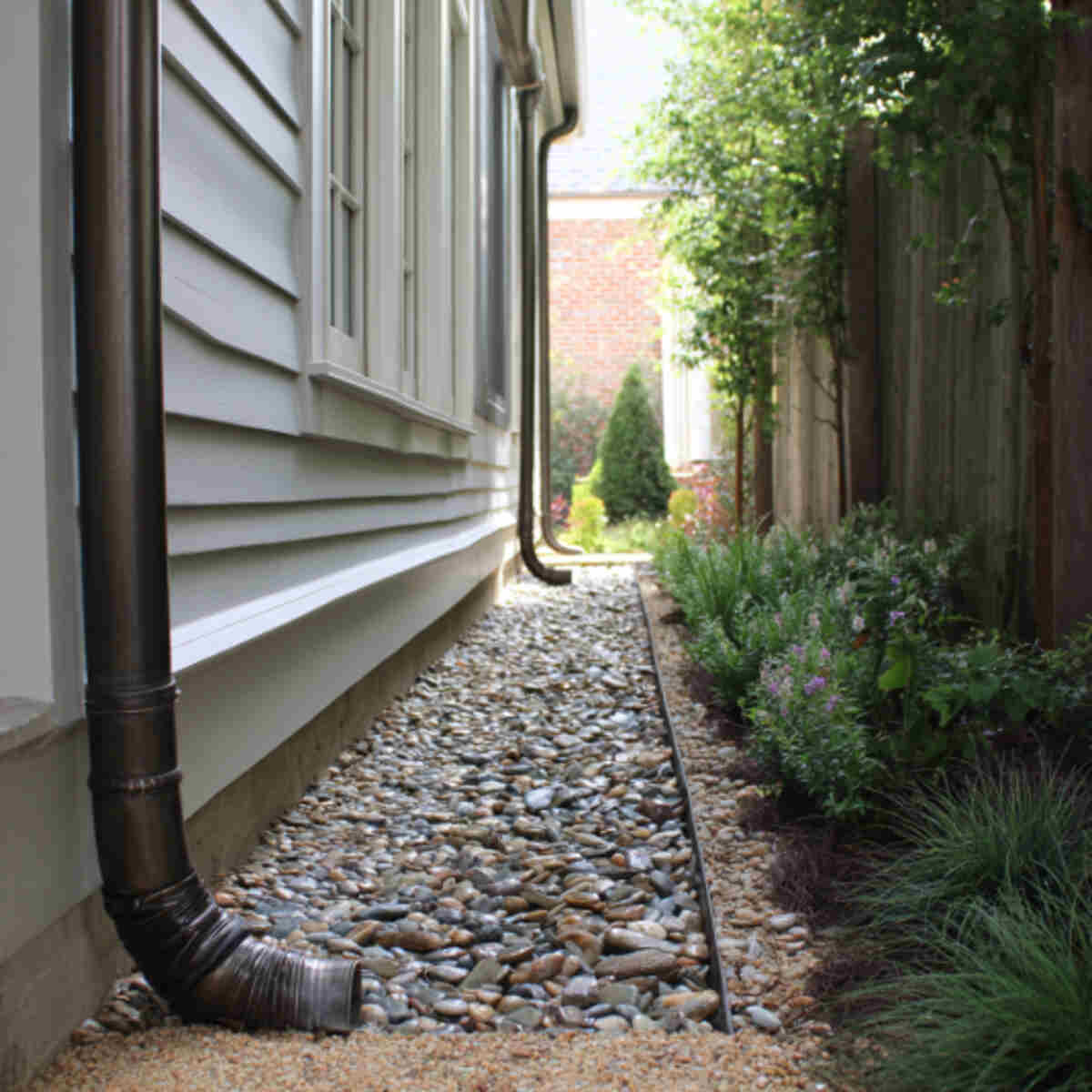 Gravel Path Under Gutter Downspouts