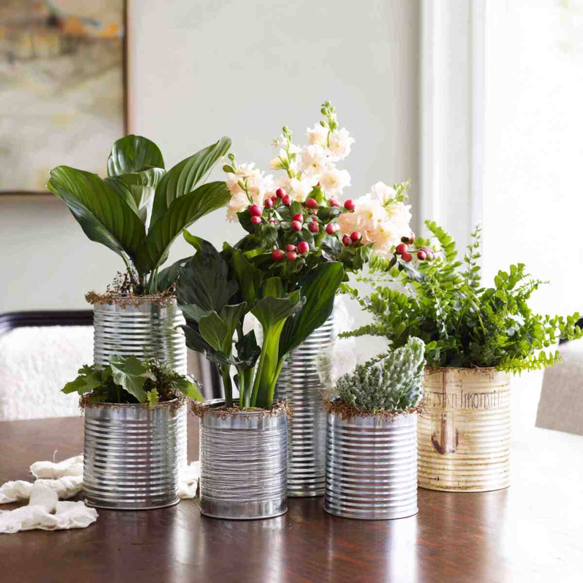 Upcycled Tin Cans as Centerpiece Planters for Tables