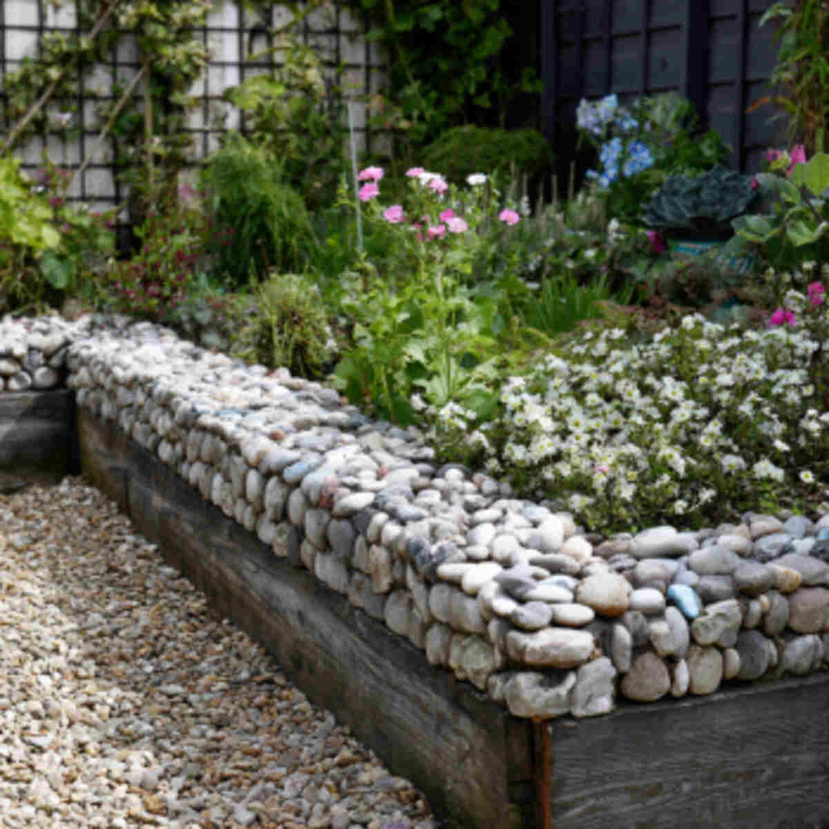 Garden bed with pebble-filled st