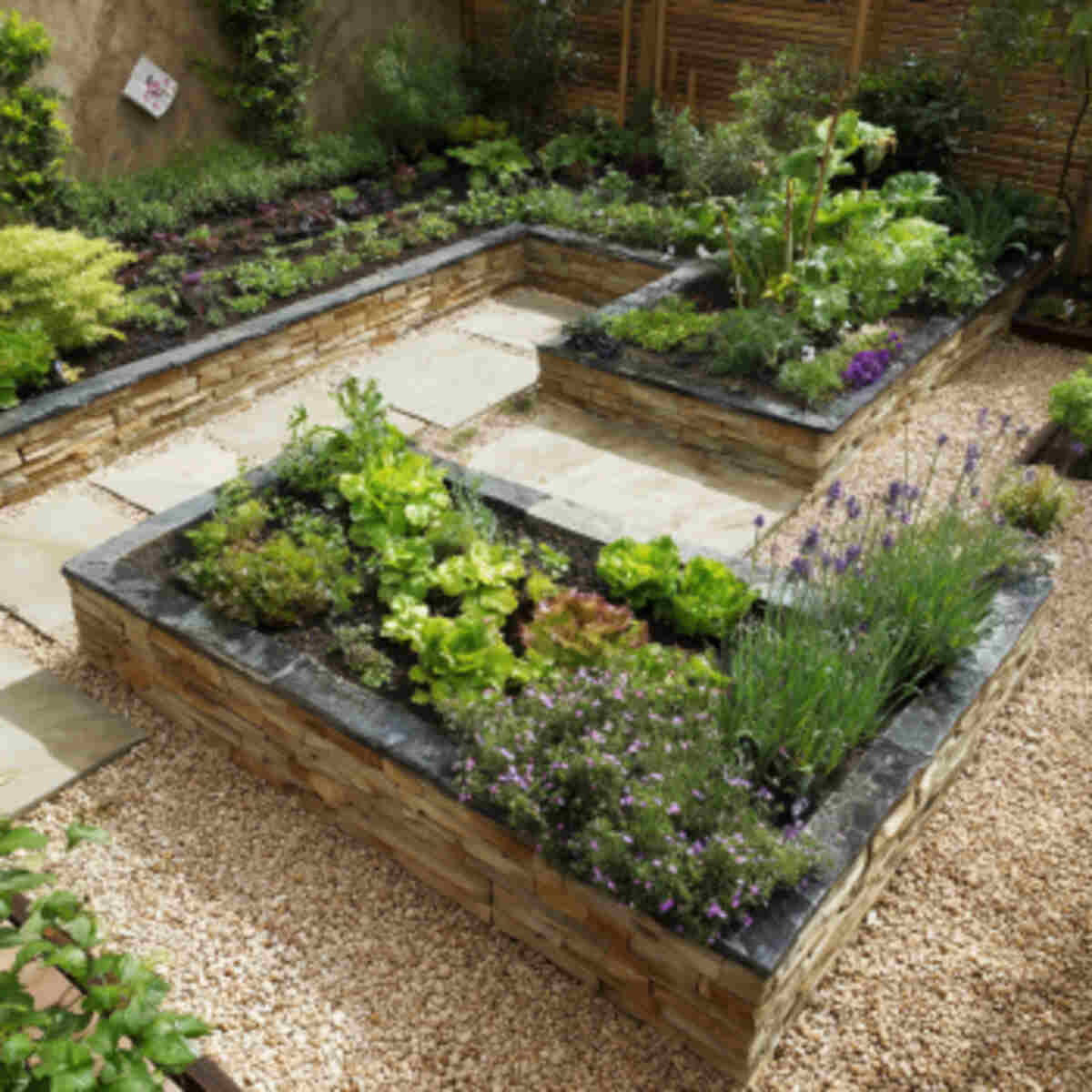 L-shaped raised garden with flag